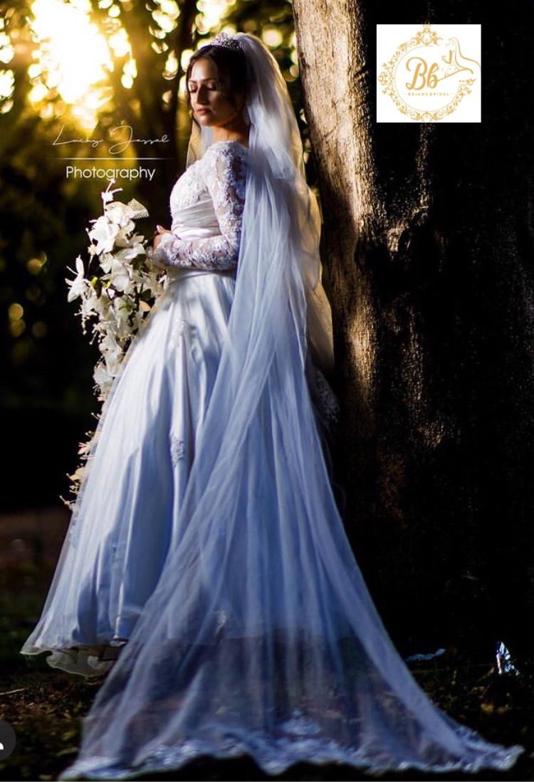 christian wedding gowns [ manufacturing / rental image