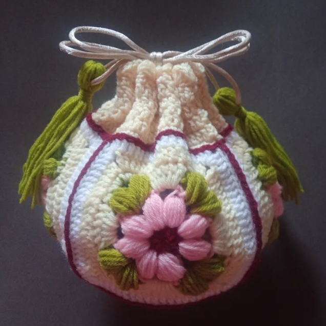 Crochet Woollen Potli Bag (Green Tassel) image