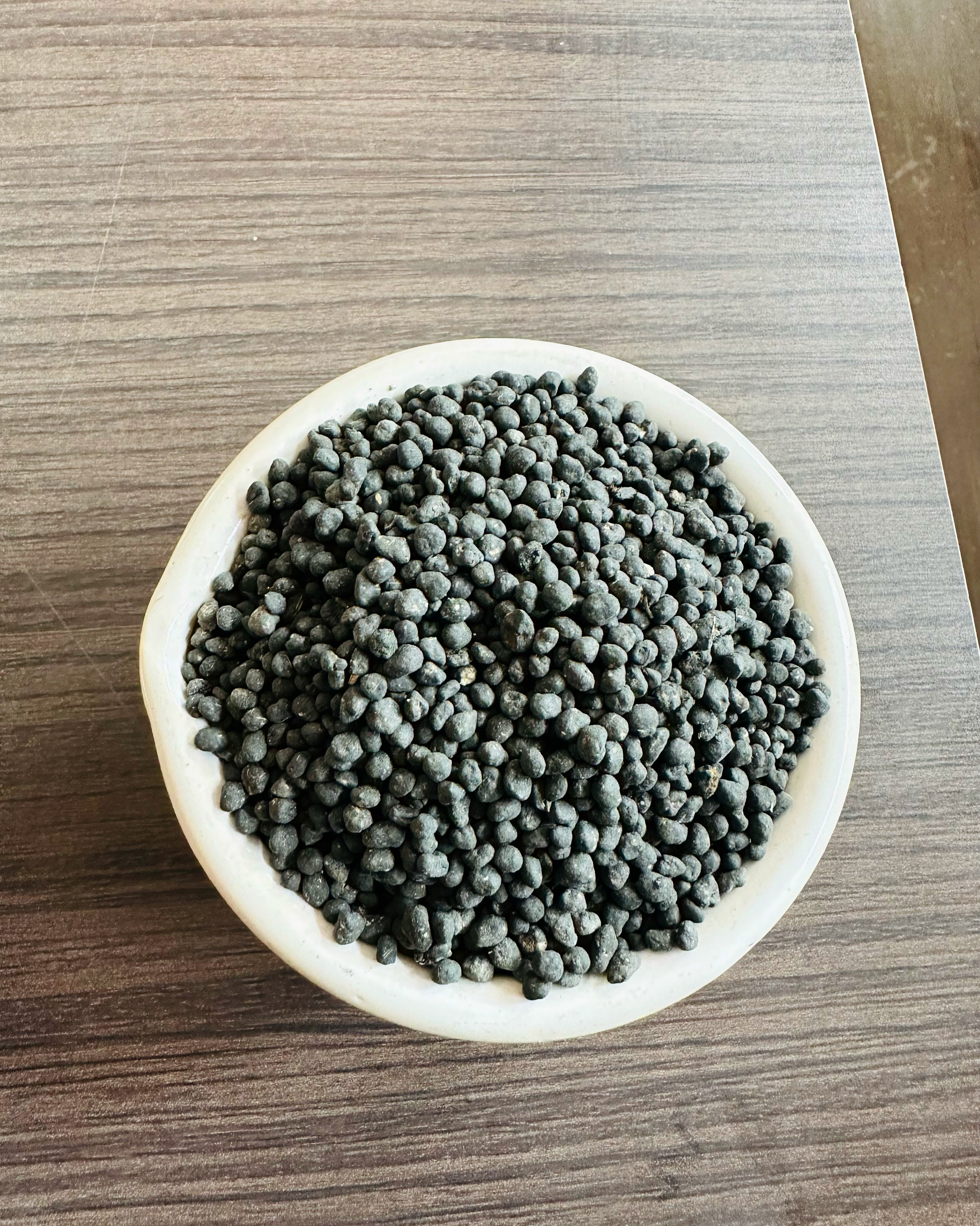 Phosphate rich organic manure PROM granules  image