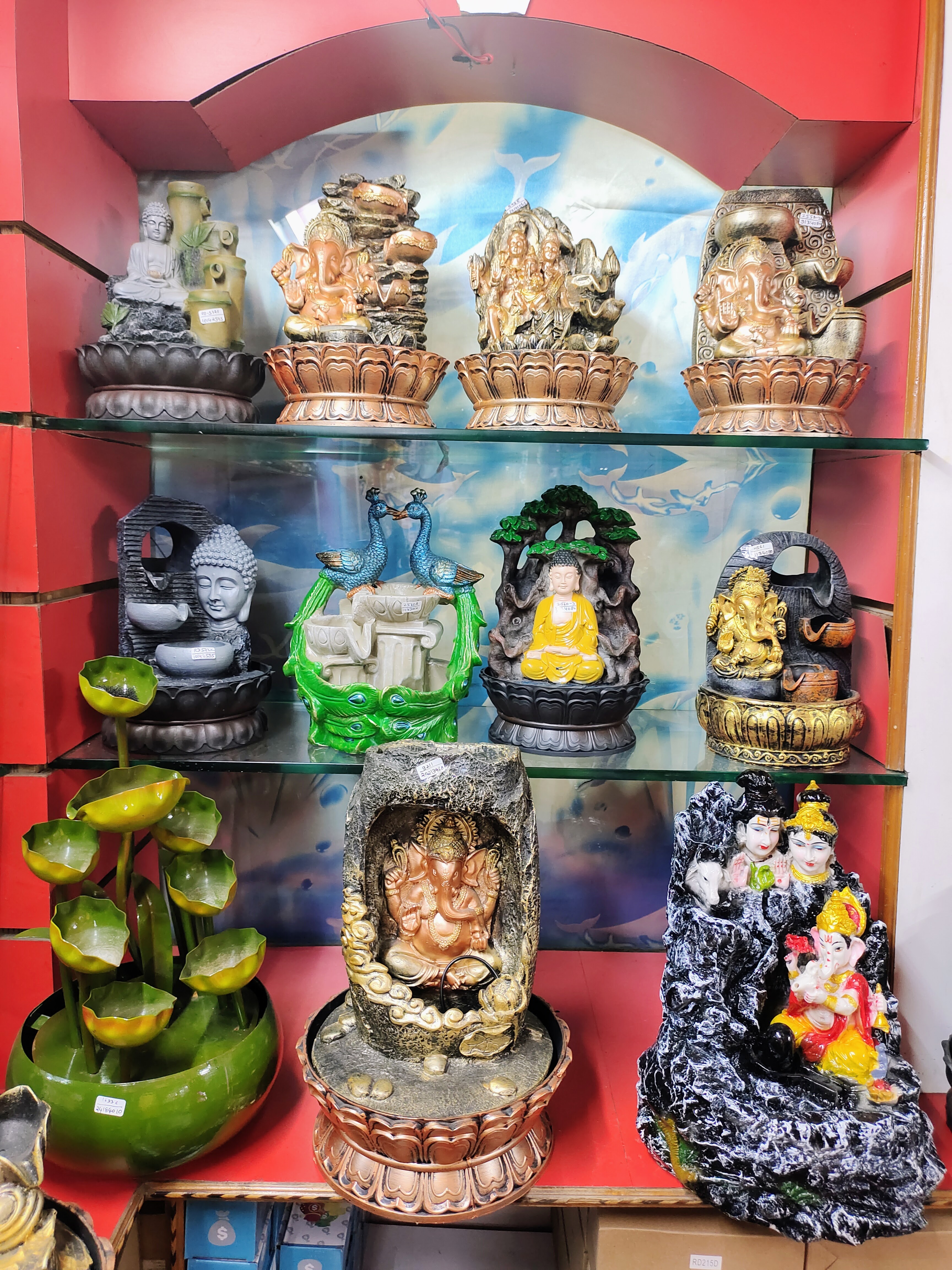 Ganeshji idols, Radha Krishna idols, Buddha Idols, Lakshmi Idols, Photo Frame, Wall Clock, Water Foundation, Horse Idols, Monks, Laughing Budhha Idols, Balaji Idols, table clocks, Metal Items and Antique items. image