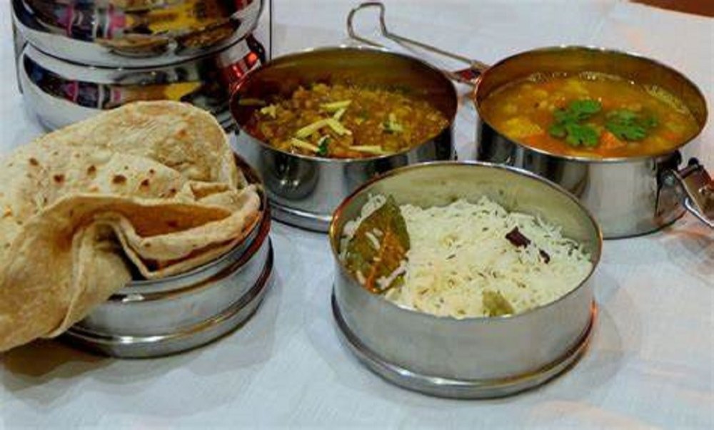 दाल चावल रोटी सलाद अचार सब्जी image