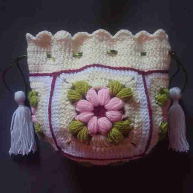 Crochet Woollen Potli Bag (White Tassel) image
