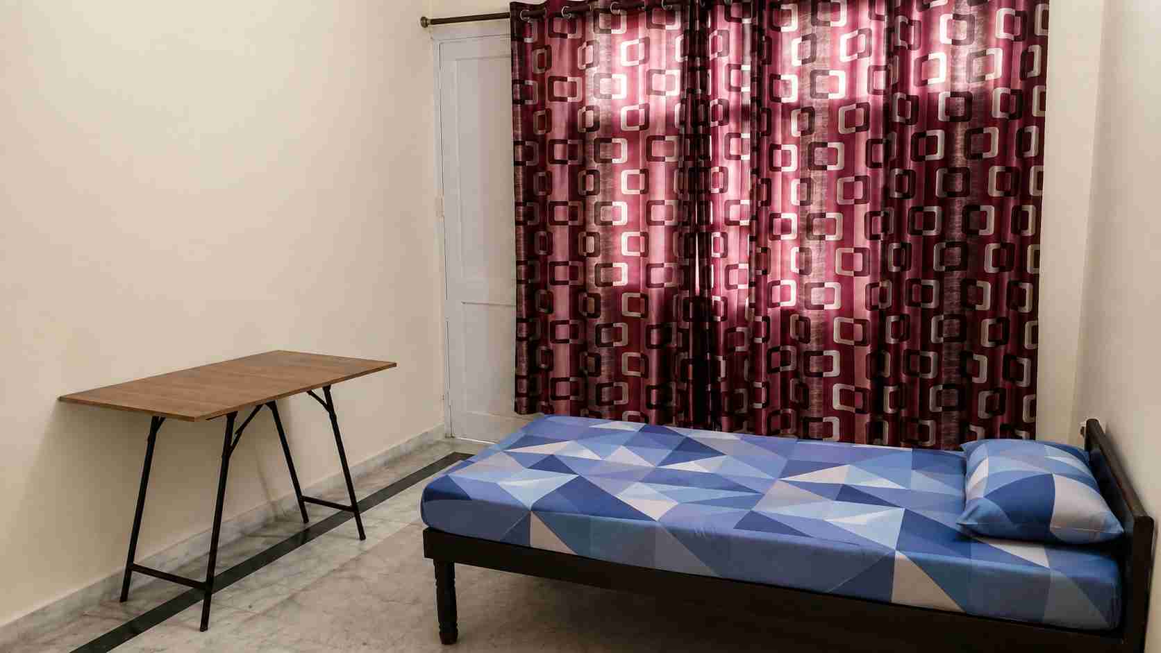 Shri Shyam PG in IMT Manesar Gurgaon provides comfortable paying guest accommodation with single, double-sharing and triple-sharing rooms for students and working professionals. We offer amenities including AC, RO water, washing machine, bed, mattress, wa image
